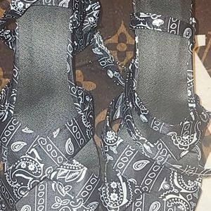 These black and white heeled Sandles